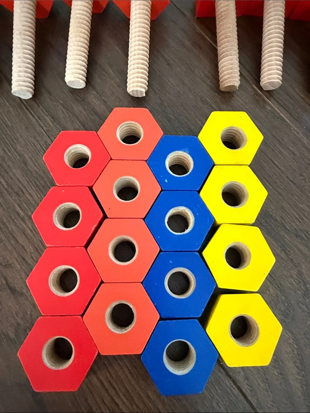 Wooden Bolt and Nut Building Toy Set - Red, Blue, Yellow